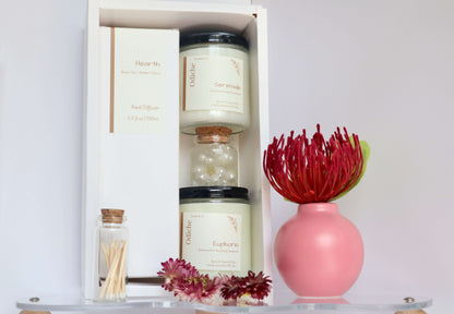 Luxurious Mother’s Day gift set with hand-poured soy candles and reed diffuser in an eco-friendly box.